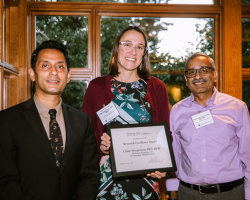 Claire Margerison receives her Research Excellence Award